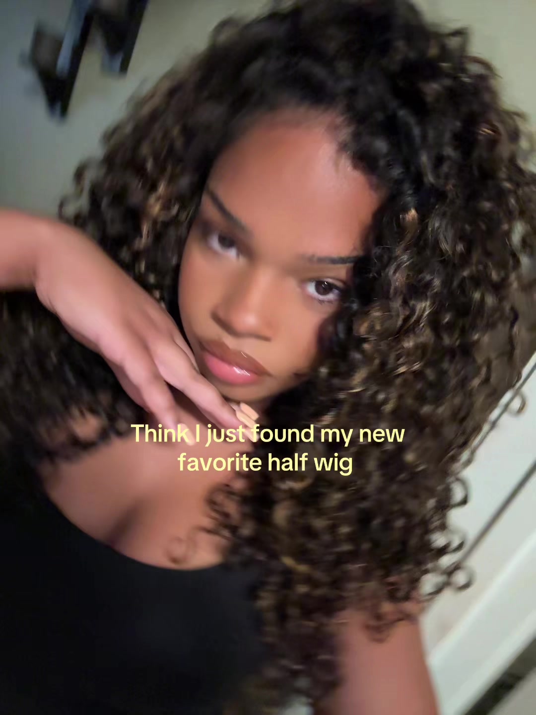 TikTok post by an influencer for OQHAIR. Caption reads: I love @OQHAIR half wigs soooo much. [...].