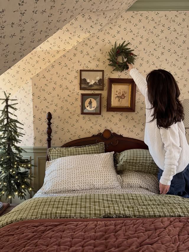 Instagram post by @prettyinthepines for The Company Store. Caption reads: Christmasy corners around the house 🌲including a....