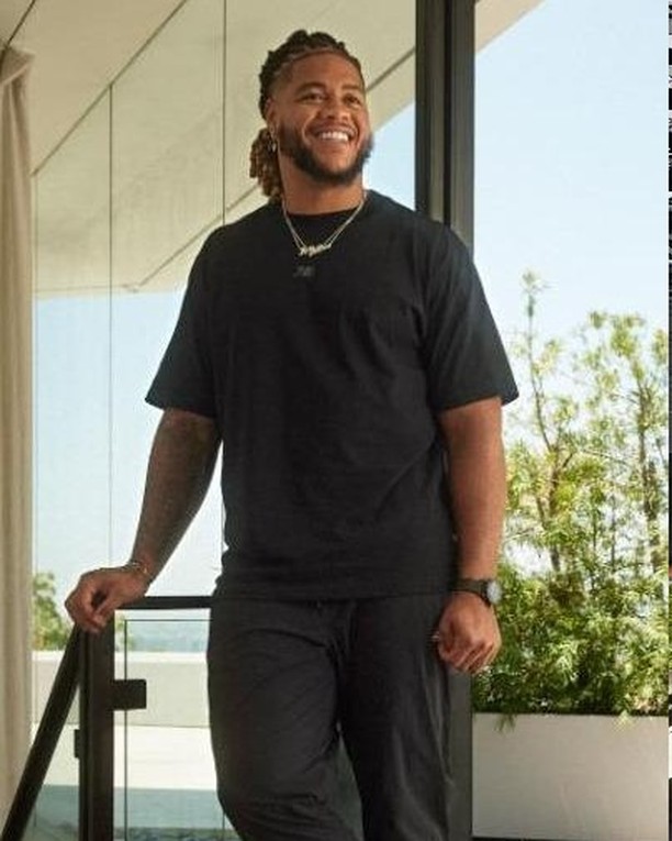 Instagram post by @chaseyoung for Champs Sports. Caption reads: Unboxing the New Balance 740 with @chaseyoung....