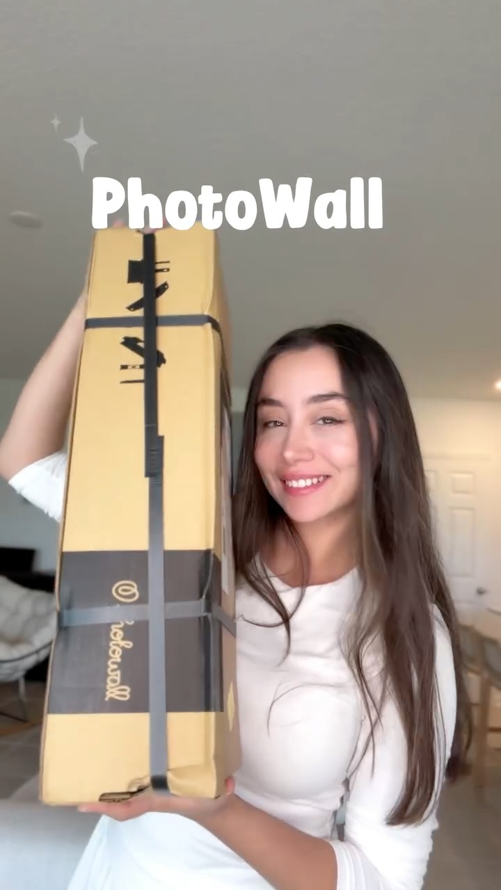 Instagram post by @meysafindings for Photowall. Caption reads: Transform your space with the stunning Pink Marble....