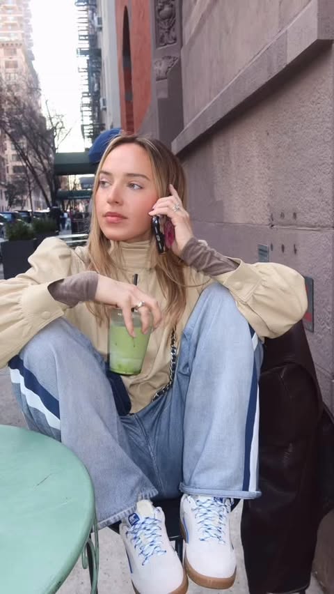 Instagram post by @gretalouisetome for SOREL. Caption reads: around my neighborhood in @sorelfootwear....