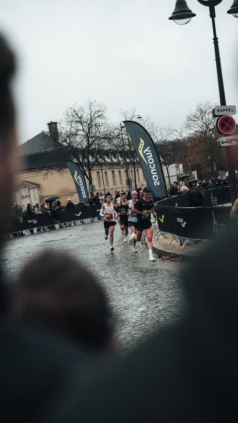 Instagram post by @maurelemm for Saucony. Caption reads: PRs fell at the @10kmdelatoureiffel 🔥Huge thanks....