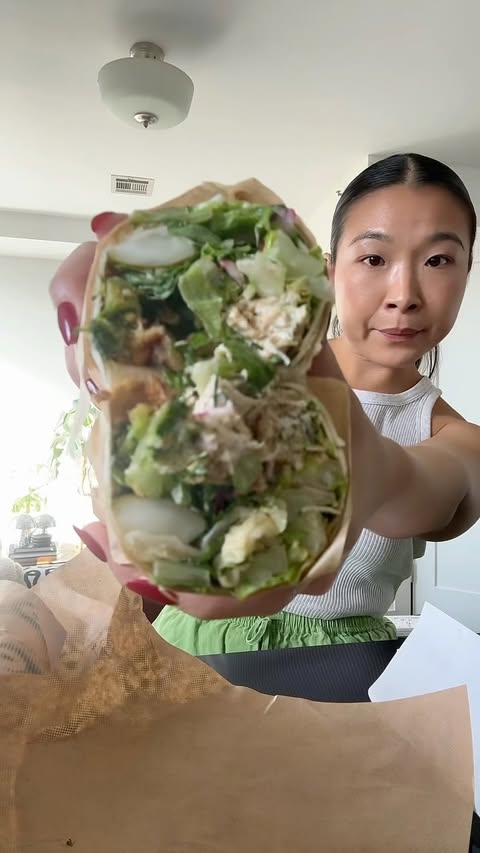 Instagram post by @careeseeats for sweetgreen. Caption reads: queen @mollybaz x @sweetgreen !!!!!! 🥒 🌯....