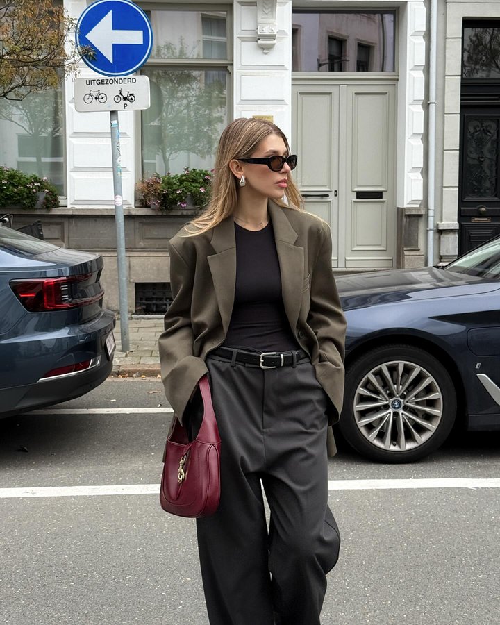 Instagram post by @cvseev for ARKET. Caption reads: khaki green blazer and burgundy bag....