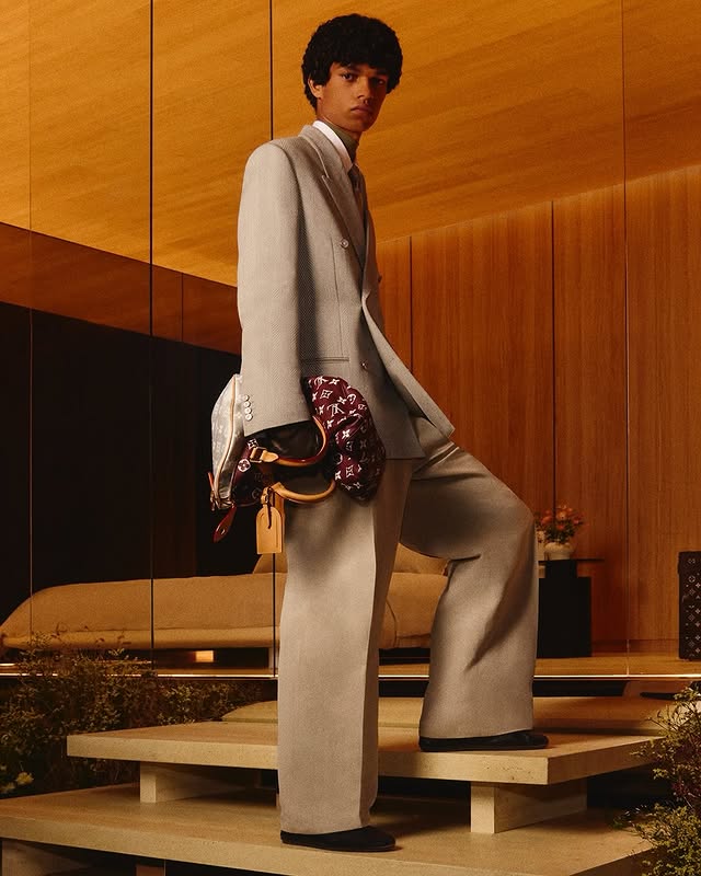 Instagram post by @pharrell for Louis Vuitton. Caption reads: [...] each look as the enduring codes of Louis....