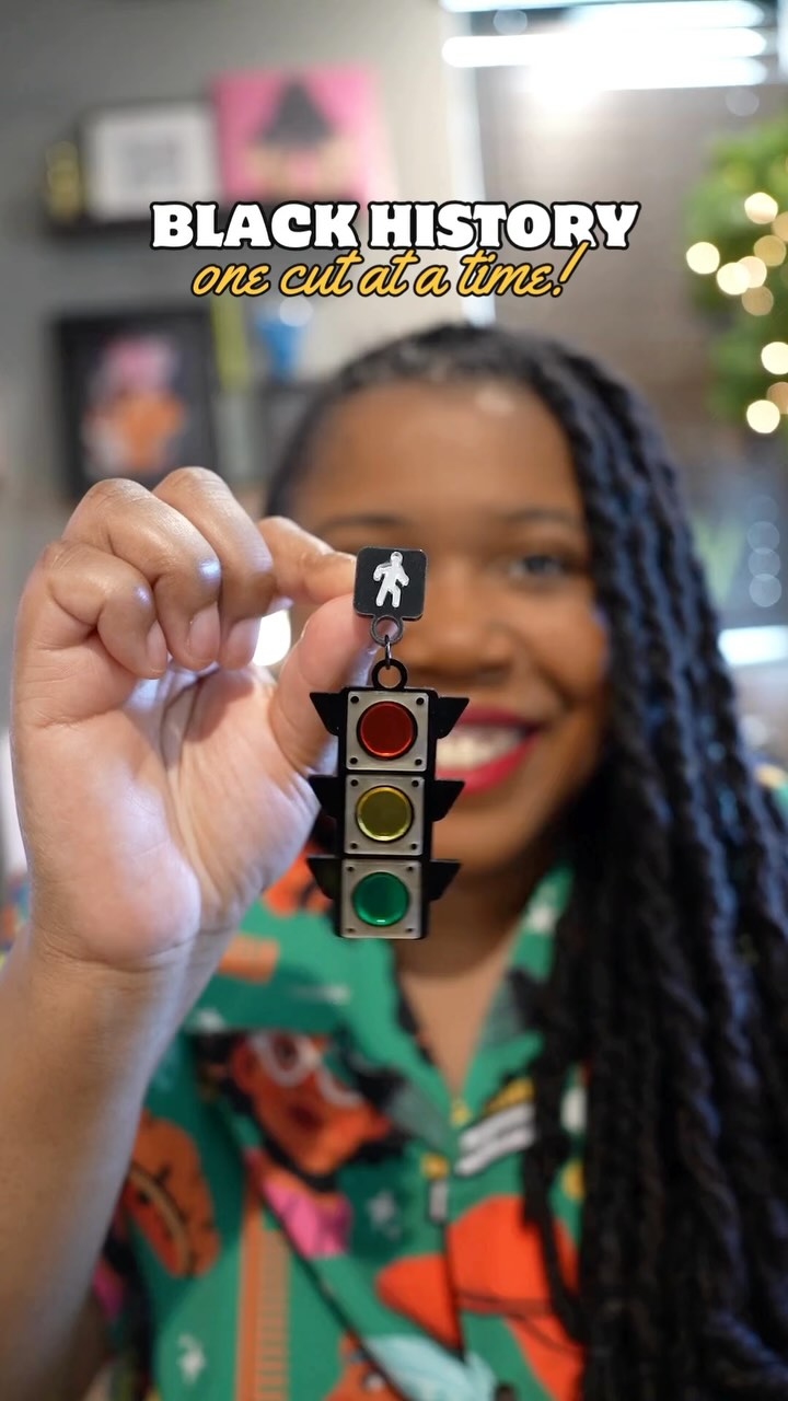Instagram post by @domothecreative for Glowforge. Caption reads: 🚦 Black History, One Cut at a Time with....
