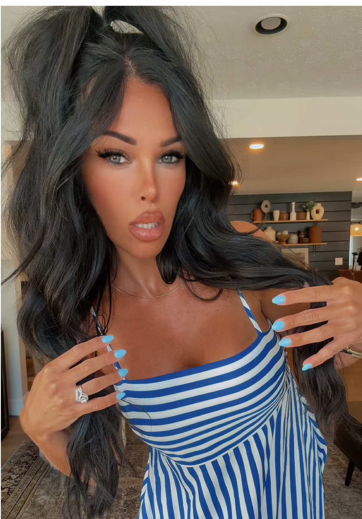 TikTok post by @followthepattersons for Cupshe. Caption reads: [...] and cream stripe dress by @cupshe_official....