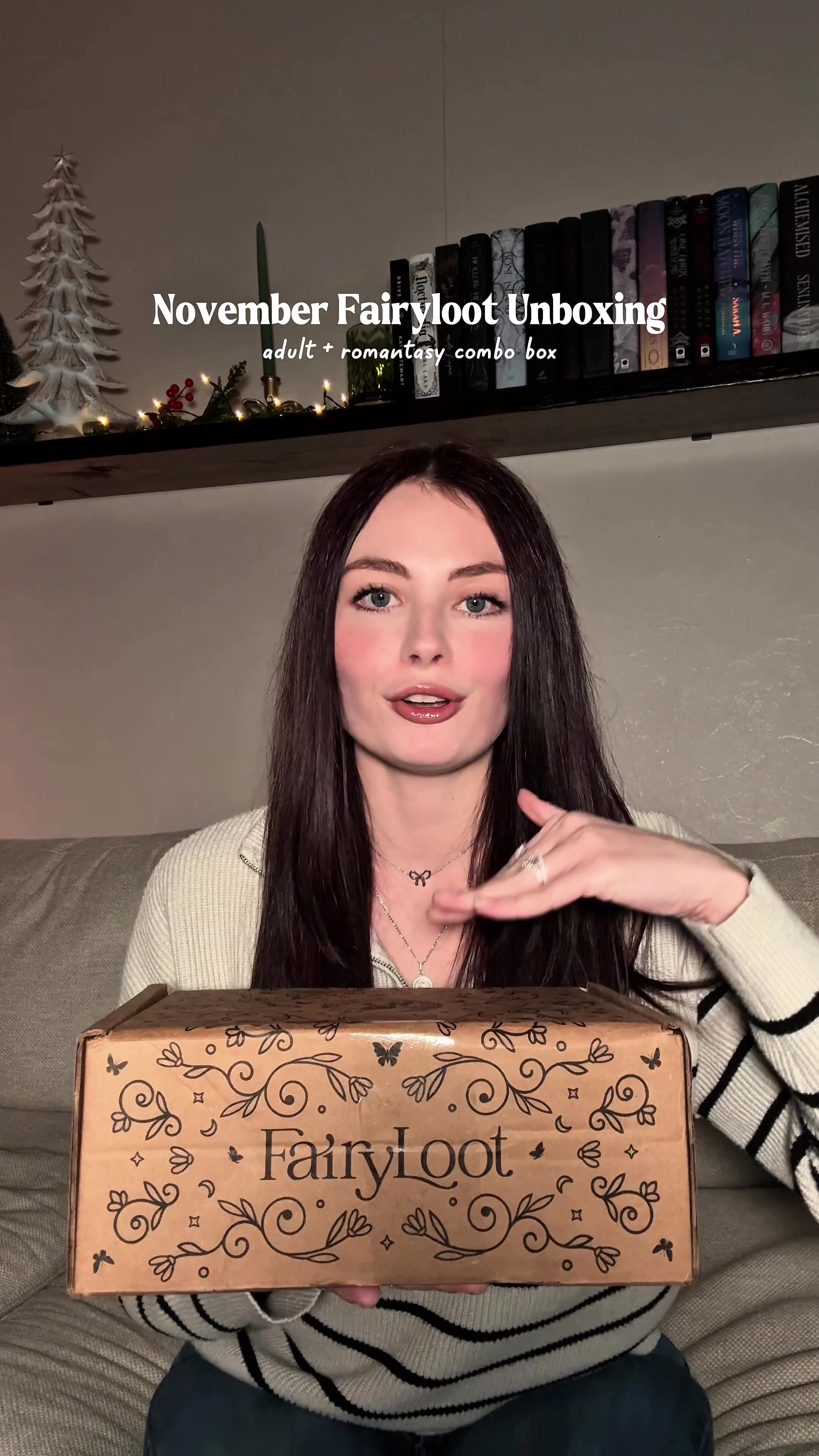 TikTok post by @bailees_bookshelf for FairyLoot. Caption reads: Unboxing the November @FairyLoot adult + romantasy....