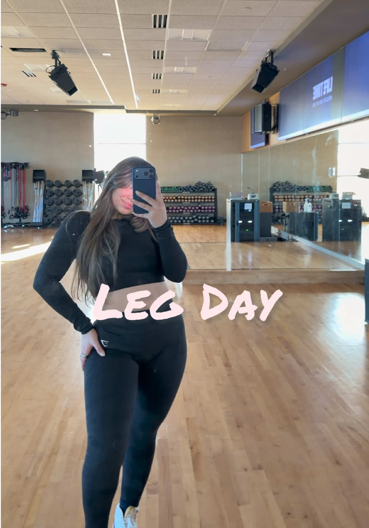 TikTok post by @chaimaeelantri for Life Time. Caption reads: @Life Time #LEGDAY 🖤.
