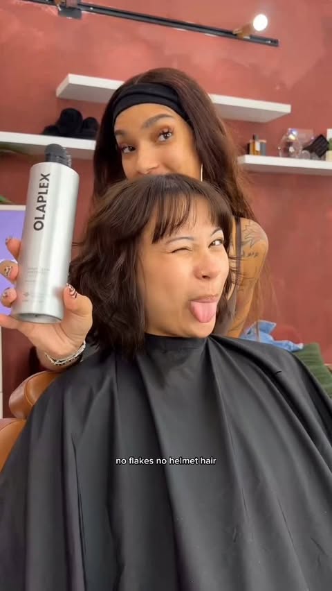 Instagram post by @sharstyles for OLAPLEX. Caption reads: Babyyy… OLAPLEX finally made a hairspray 👀 Meet....