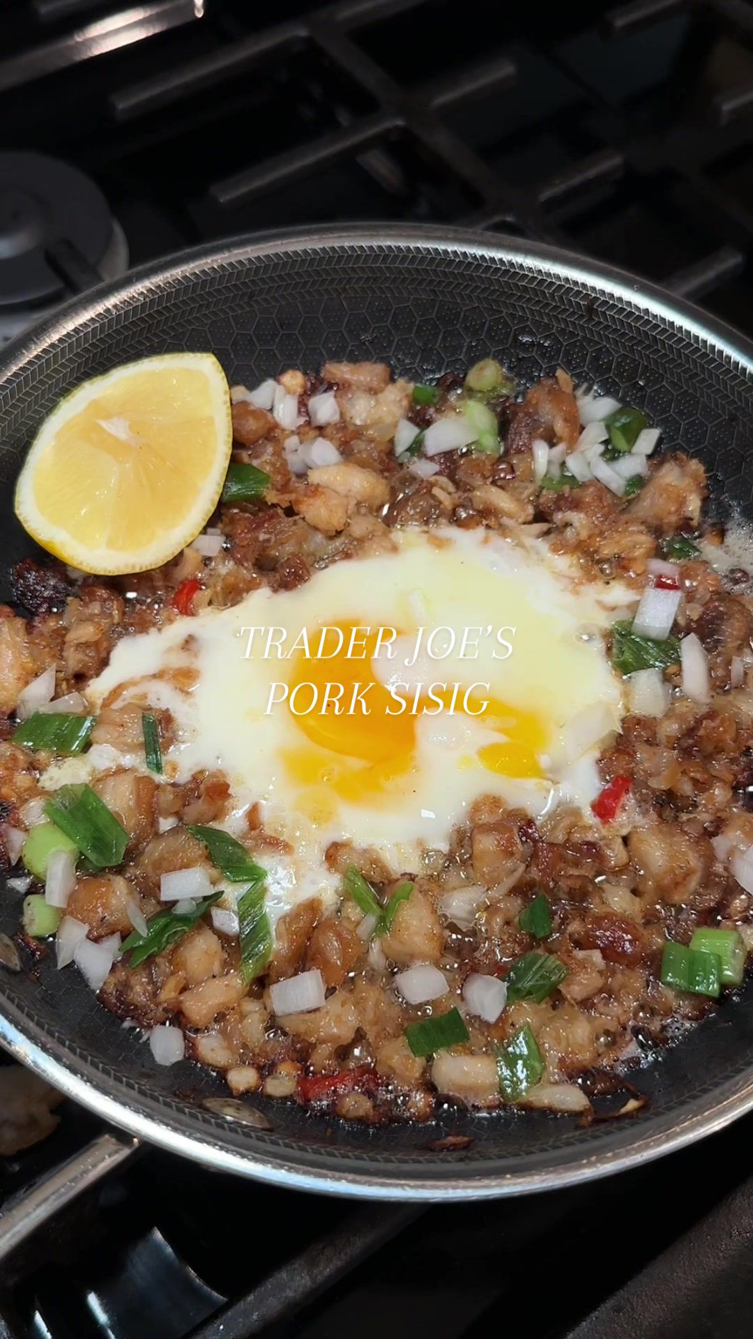 TikTok post by @katerynnnn for Trader Joe's. Caption reads: PSA for all my pork sisig lovers!! @Trader Joe's....