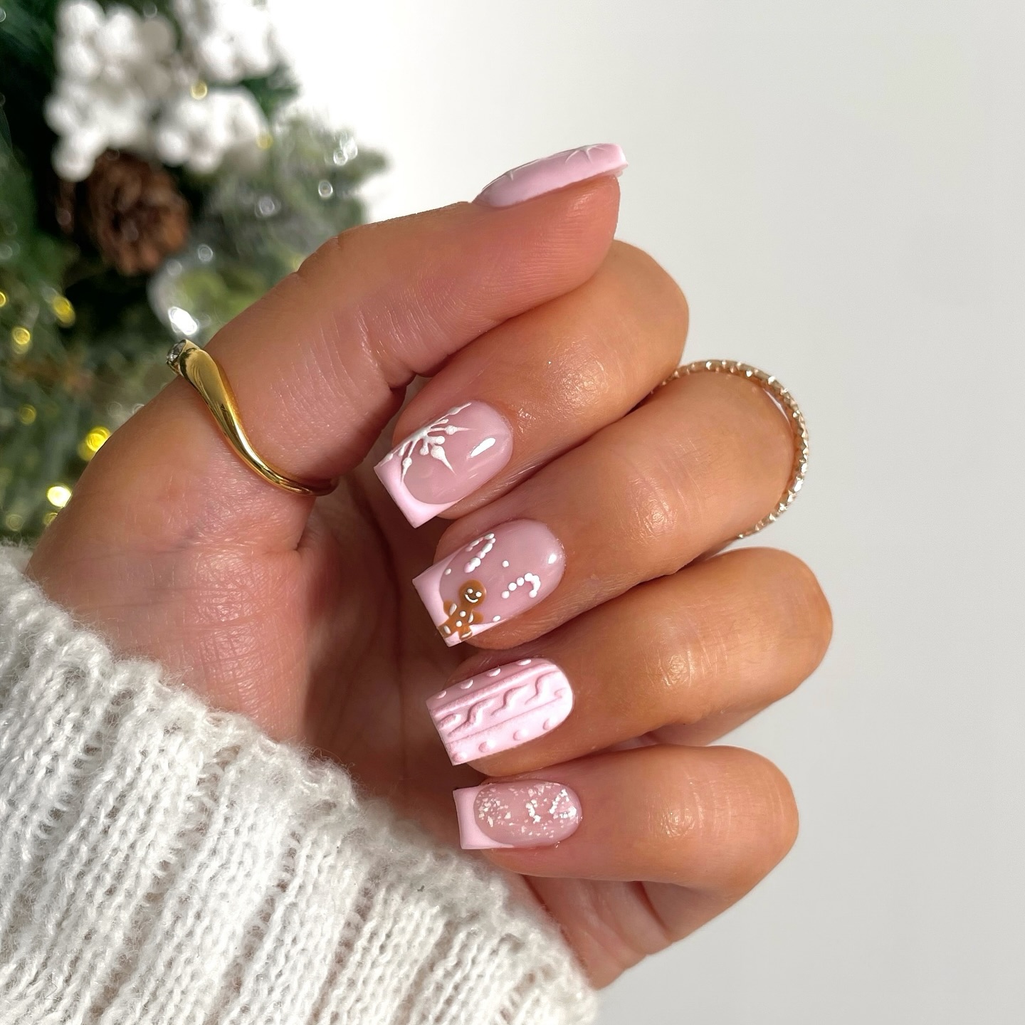 Instagram post by @by_hannahtaylor for Indigo Lune. Caption reads: Pink, Gingerbread, candy canes, snow and sweater....