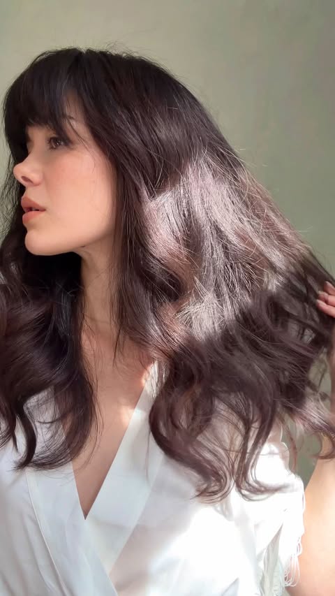 Instagram post by @alykima_ for Aveda. Caption reads: effortless undone volume with the NEW @aveda....