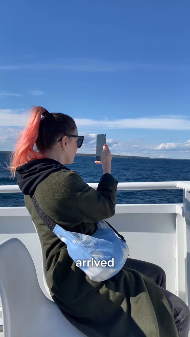 Instagram post by @aprettycoolhoteltour for Pure Michigan. Caption reads: No cars allowed - but endless amounts of charm and....