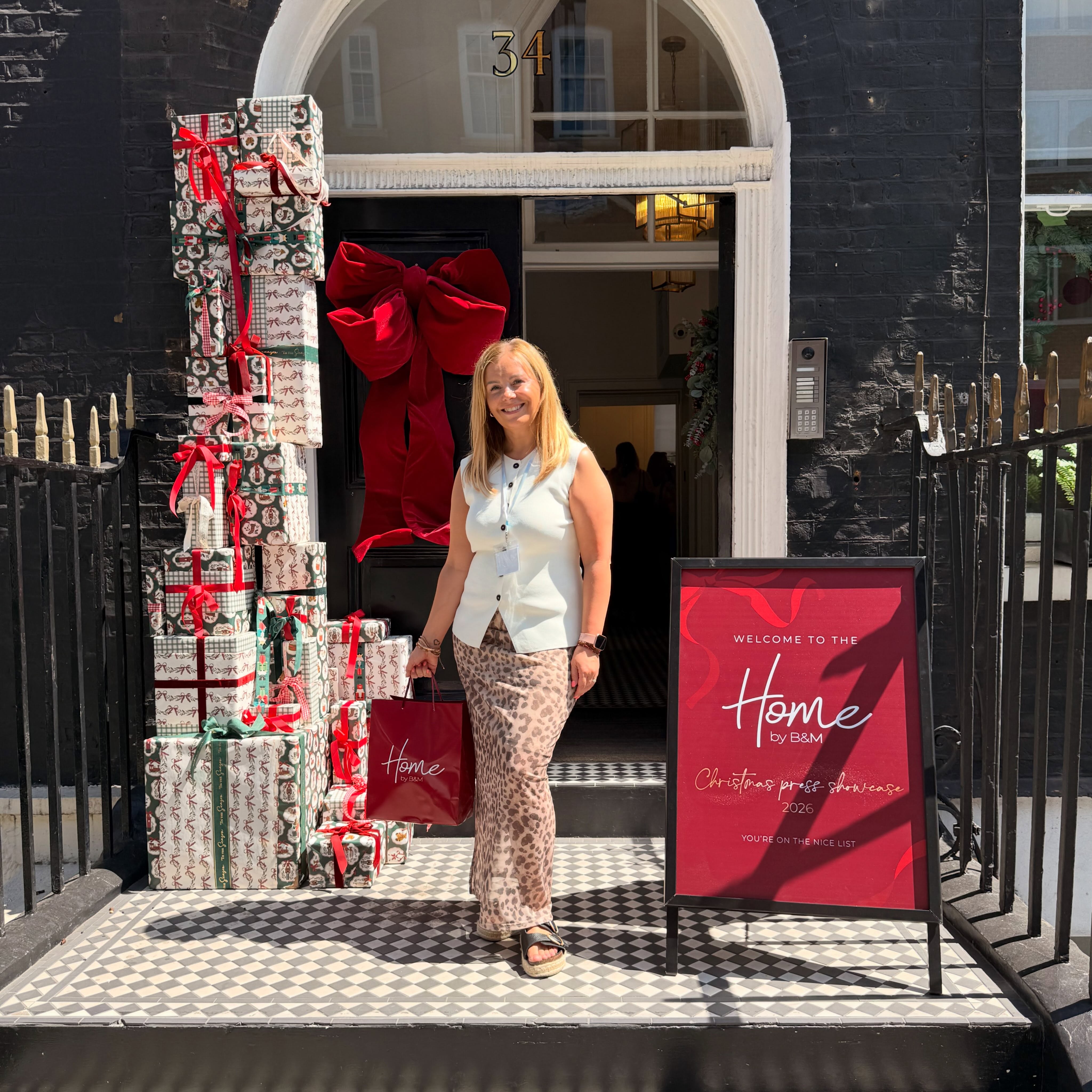 Instagram post by @maria_hewicks_home for B&M Stores. Caption reads: It’s Christmas in July 🎄😎🎅😂 Today I went to....