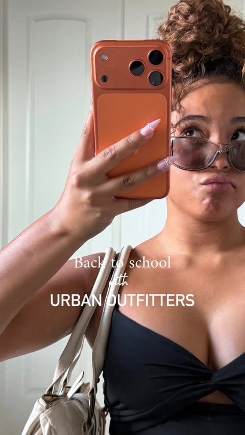Instagram post by @mckenzieecole for Urban Outfitters. Caption reads: Back to school looks with Urban Outfitters! Two....