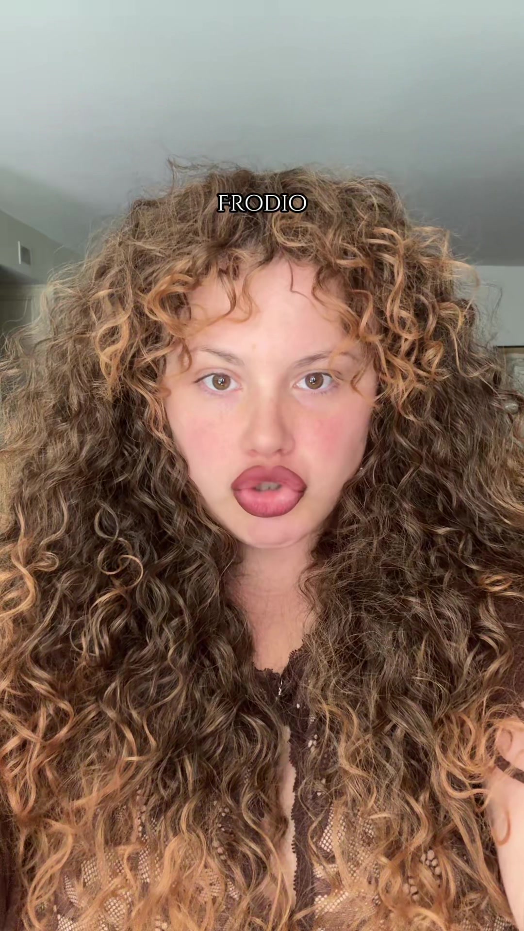 TikTok post by @chunky.cherub for Frodio Hair. Caption reads: @FRODIO understands my wig obsession, and was....