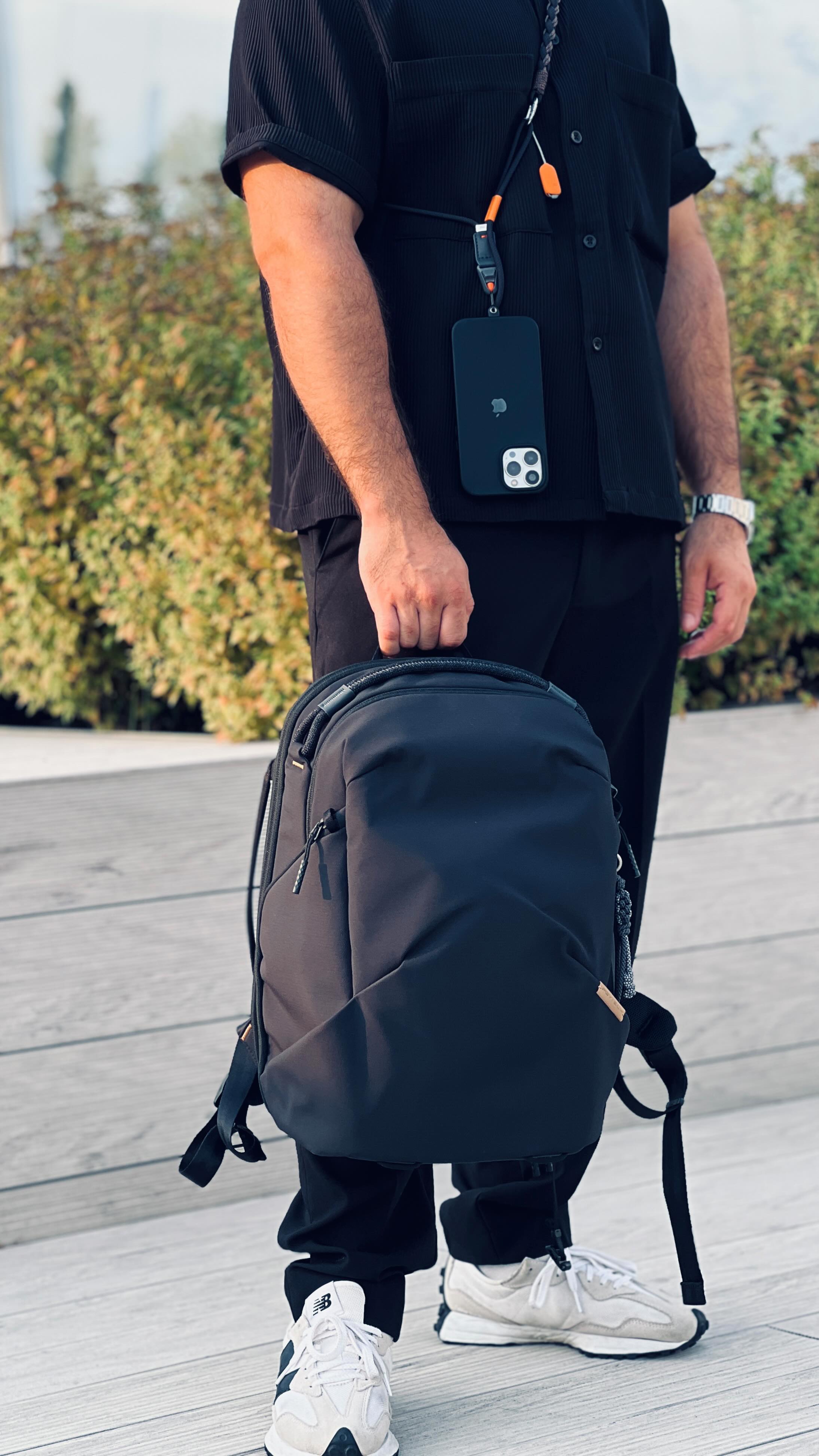 Instagram post by @pgytech.de for PGYTECH. Caption reads: [...] 🖤 This black sling bag from @pgytechglobal....