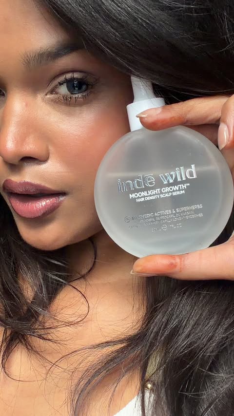 Instagram post by @manya.chandra_ for indē wild. Caption reads: #ad Shoot hair, meet self-care. 🤎✨ And the timing....