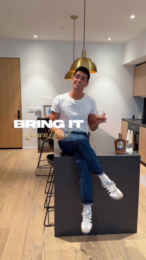 Instagram post by @ezra.sosa for Crown Royal. Caption reads: this is how i bring it 🍎🥃 w/ @crownroyal....