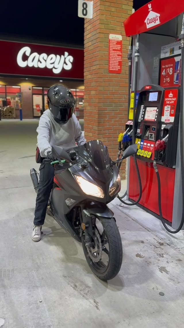 Instagram post by @sarahrides__ for KYT Americas. Caption reads: take it really slow 🧎‍♀️ Helmet : @kytamericas....