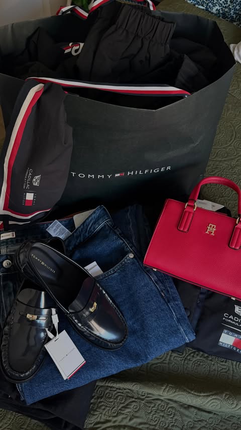 Instagram post by @tasiajewelx for Cadillac. Caption reads: AHHH!!! she’s a @tommyhilfiger x @cadillacf1 girly....