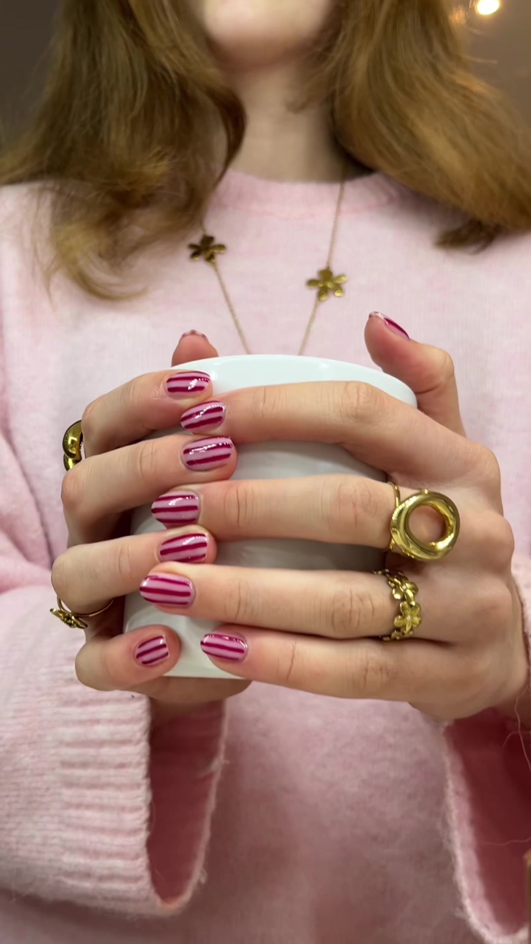 TikTok post by @just.silke_ for Pink Gellac. Caption reads: [...] #nailinspo #stripes #pinkred #fyp #viral....