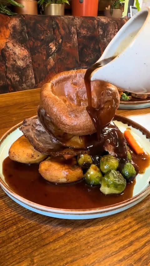 Instagram post by @thewoodlandswidnes for Get Reviewed Liverpool. Caption reads: The Woodlands Bar and Grill in Widnes is already....