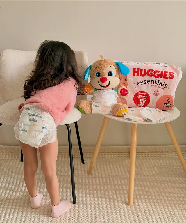 Instagram post by an influencer for Huggies. Caption reads: [...] day and night with @huggiesanz Essential....