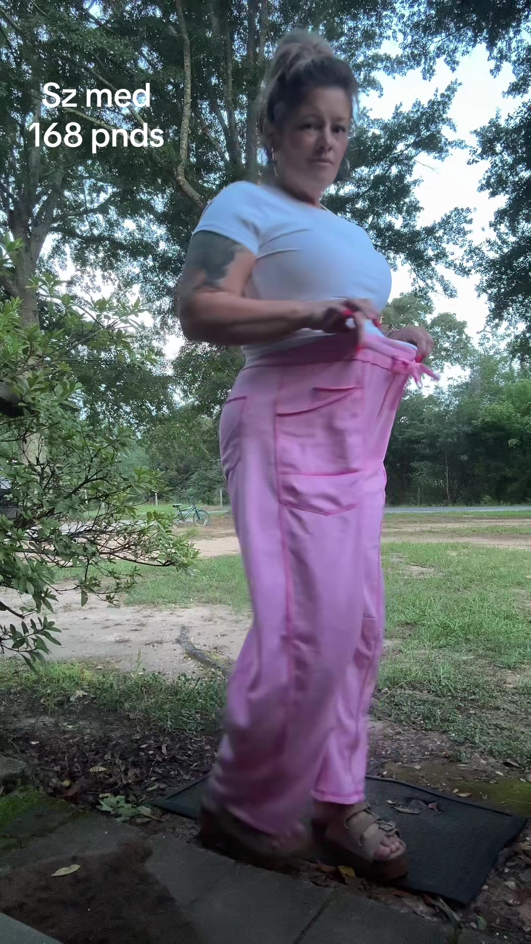TikTok post by @allalli40 for TanmingFashion. Caption reads: This pink is chefs kiss @TanmingFashion #pants....