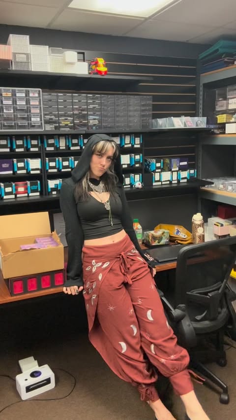 Instagram post by @maelefay for HolyClothing. Caption reads: had to sport my new pants to be as whimsical as....