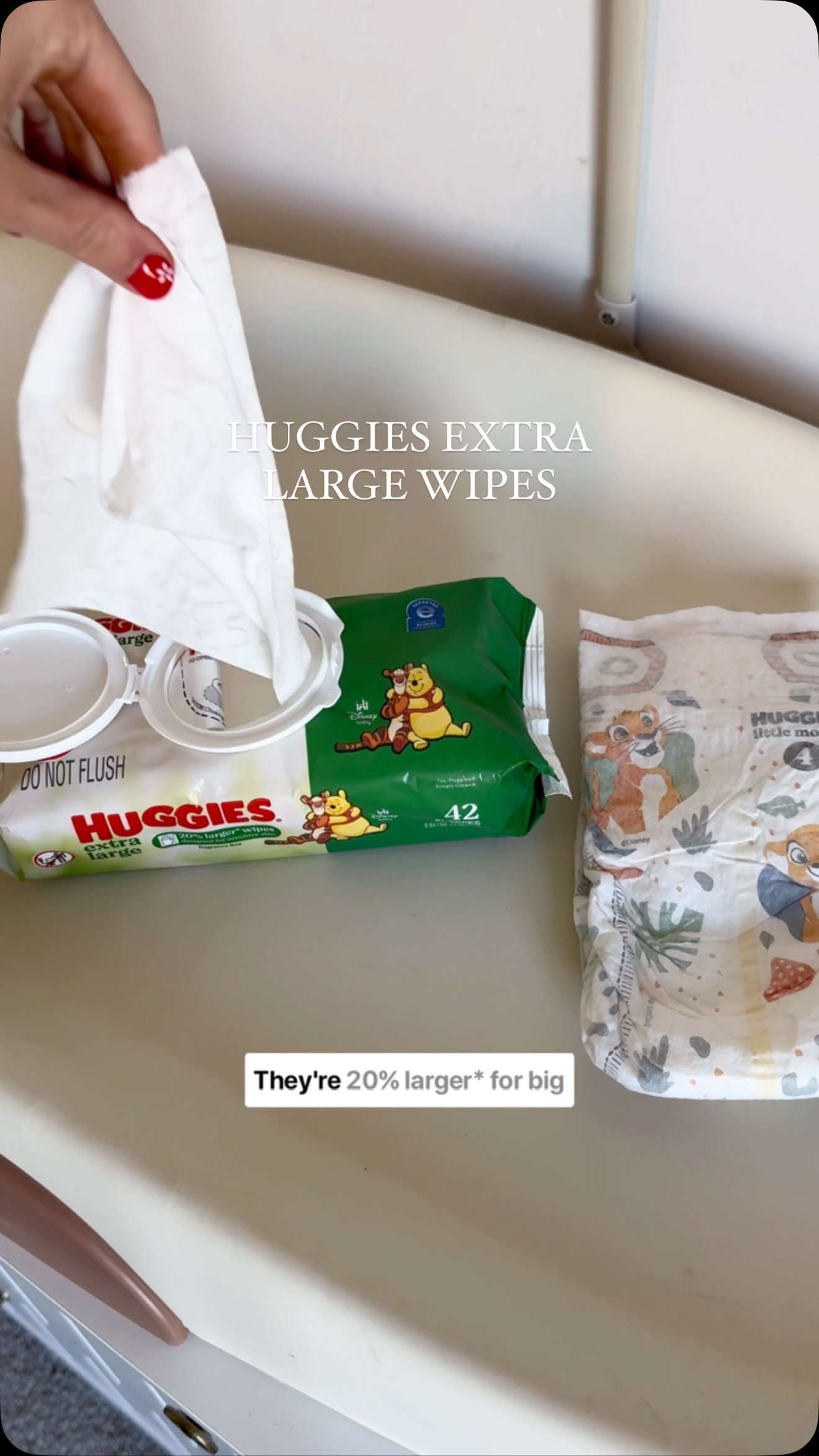 Instagram post by an influencer for Huggies. Caption reads: [...] hands clean: 1 baby mess + 1 Huggies Extra....