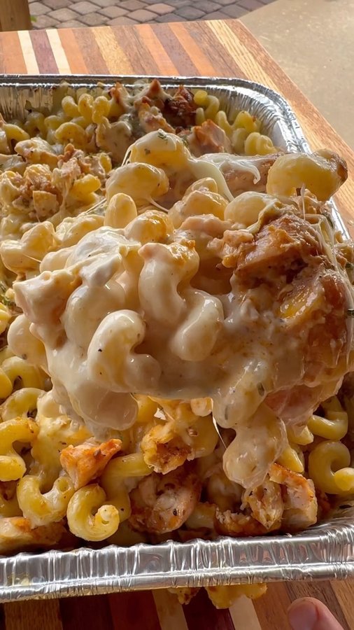 Instagram post by @cookinginthemidwest for Bear Mountain BBQ. Caption reads: #sponsored Smoked Buffalo Chicken Pasta is easy to....