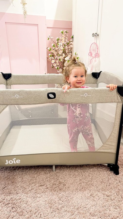 Instagram post by @elvieviolet_ari for Joie Baby Gear. Caption reads: AD/ Travel cot of dreams introducing “The....