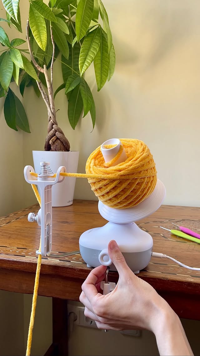 Instagram post by @slowlypoppinstitches for Caydo. Caption reads: [...] yarn winder was gifted to me from....