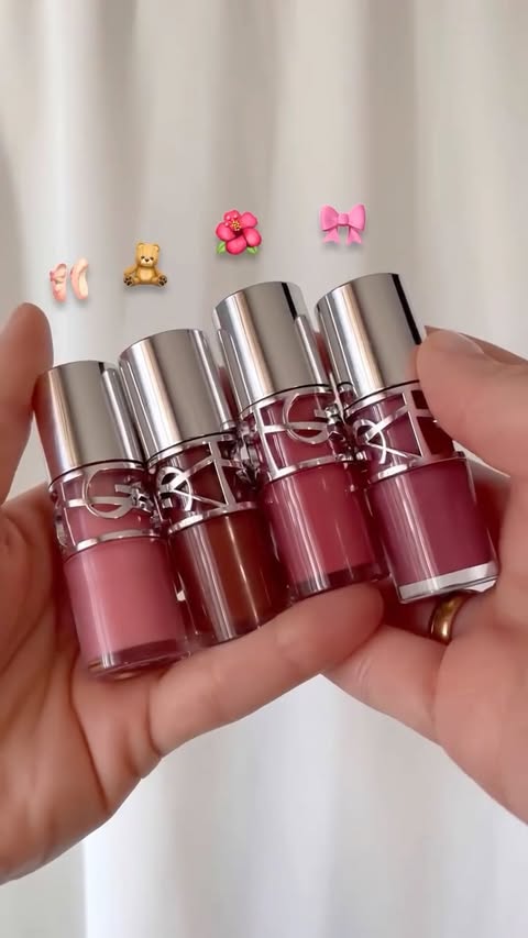 Instagram post by an influencer for YSL Beauty. Caption reads: [...] plumping lip oil gloss 💋 @yslbeauty I am in....