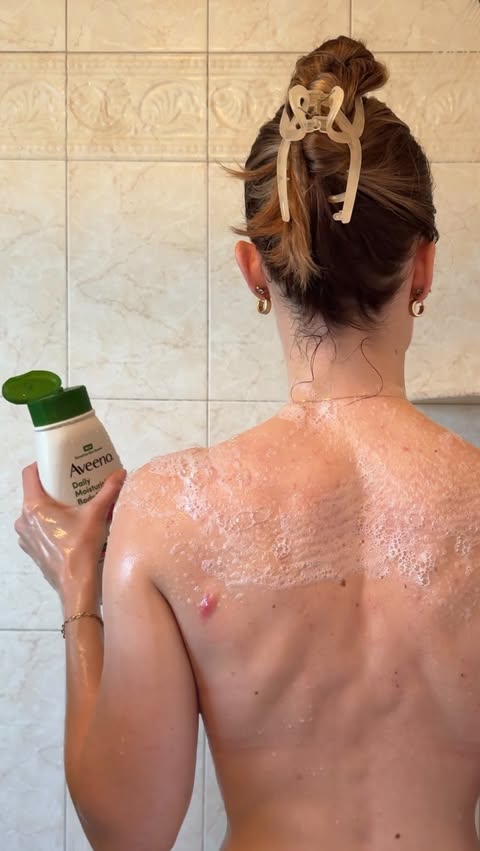 Instagram post by @noracummins_ for Aveeno. Caption reads: Finally loving body care again 🤍 @aveenous....