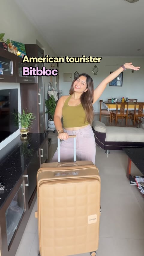 Instagram post by @shubhangi1102 for American Tourister. Caption reads: [...] Comment “CODE” for 5% OFF! ✈️....