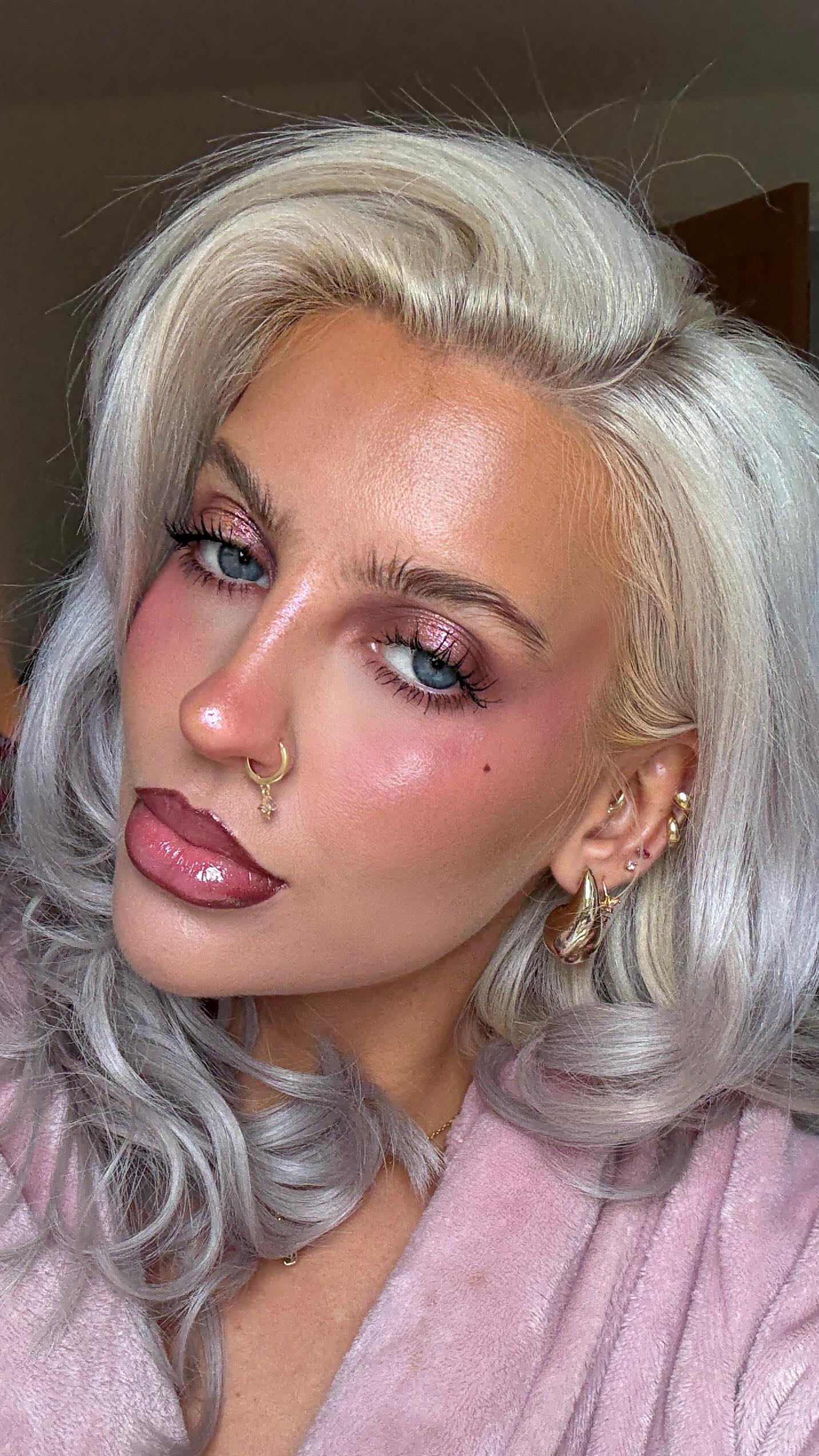 Instagram post by @bigfatjenna for Makeup Revolution. Caption reads: AD oh i’m soooo ready for the christmas glams 🥹....