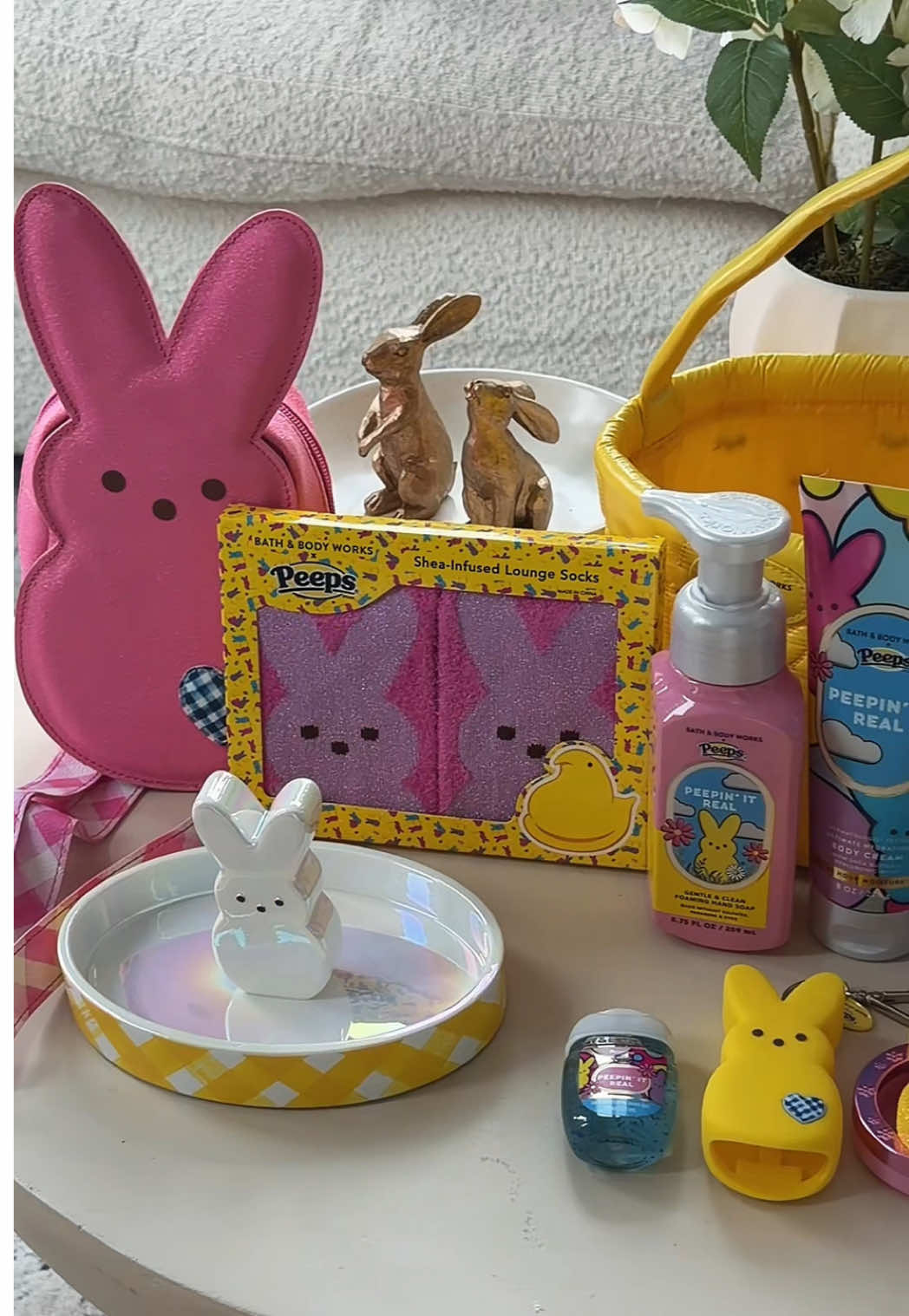 TikTok post by @elysian.living for Bath & Body Works. Caption reads: [...] the new @peepsbrand x @Bath & Body Works....