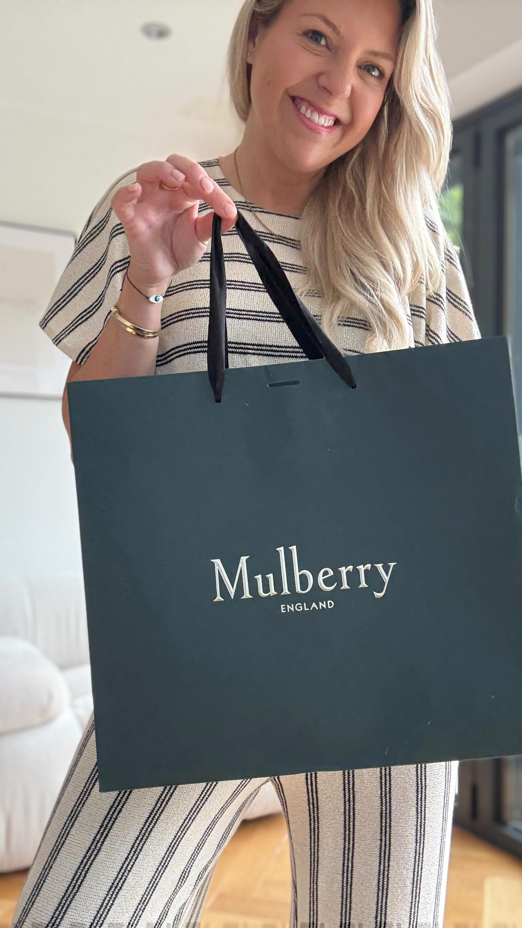 Instagram post by @amanda.raine_ for Mulberry. Caption reads: MULBERRY GIVEAWAY! My biggest yet! To celebrate....