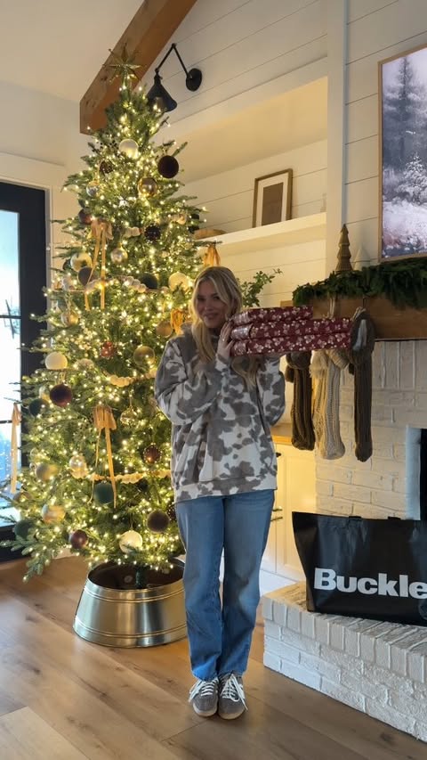 Instagram post by @maeg_thompson for Buckle. Caption reads: Holiday shopping @Buckle is officially in full....
