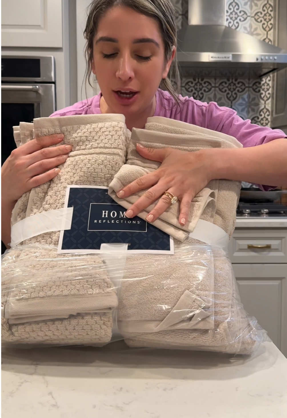 TikTok post by @shopmamaa for QVC. Caption reads: [...] #bathroomremodel #bathtowel @QVC, Inc.