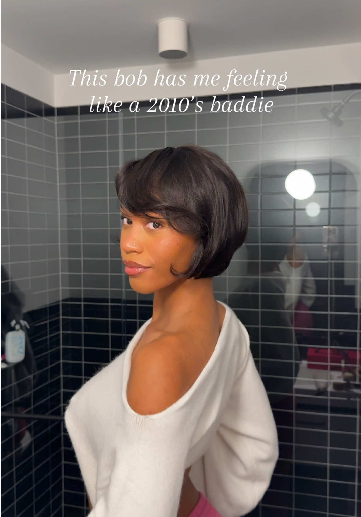 TikTok post by @rayanniaaa for Curlyme. Caption reads: I kinda loveeee?!? @CurlyMe Hair #bobwig....