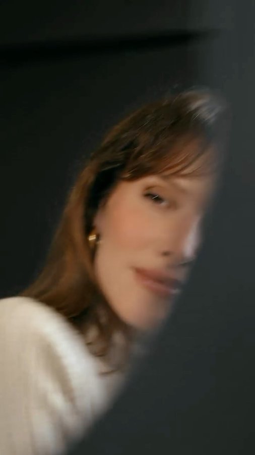 Instagram post by @ludosauer for Herno. Caption reads: Soft, cozy and chic 🤍 @herno_official #Herno #adv....