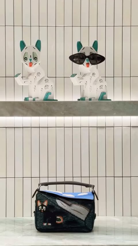 Instagram post by @violetgrace_ for LOEWE. Caption reads: stepping inside @loewe’s latest creative universe....