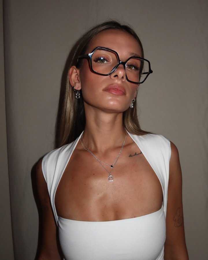 Instagram post by @iineezka for TOUS. Caption reads: back to the basics with @tousjewelry reklama.