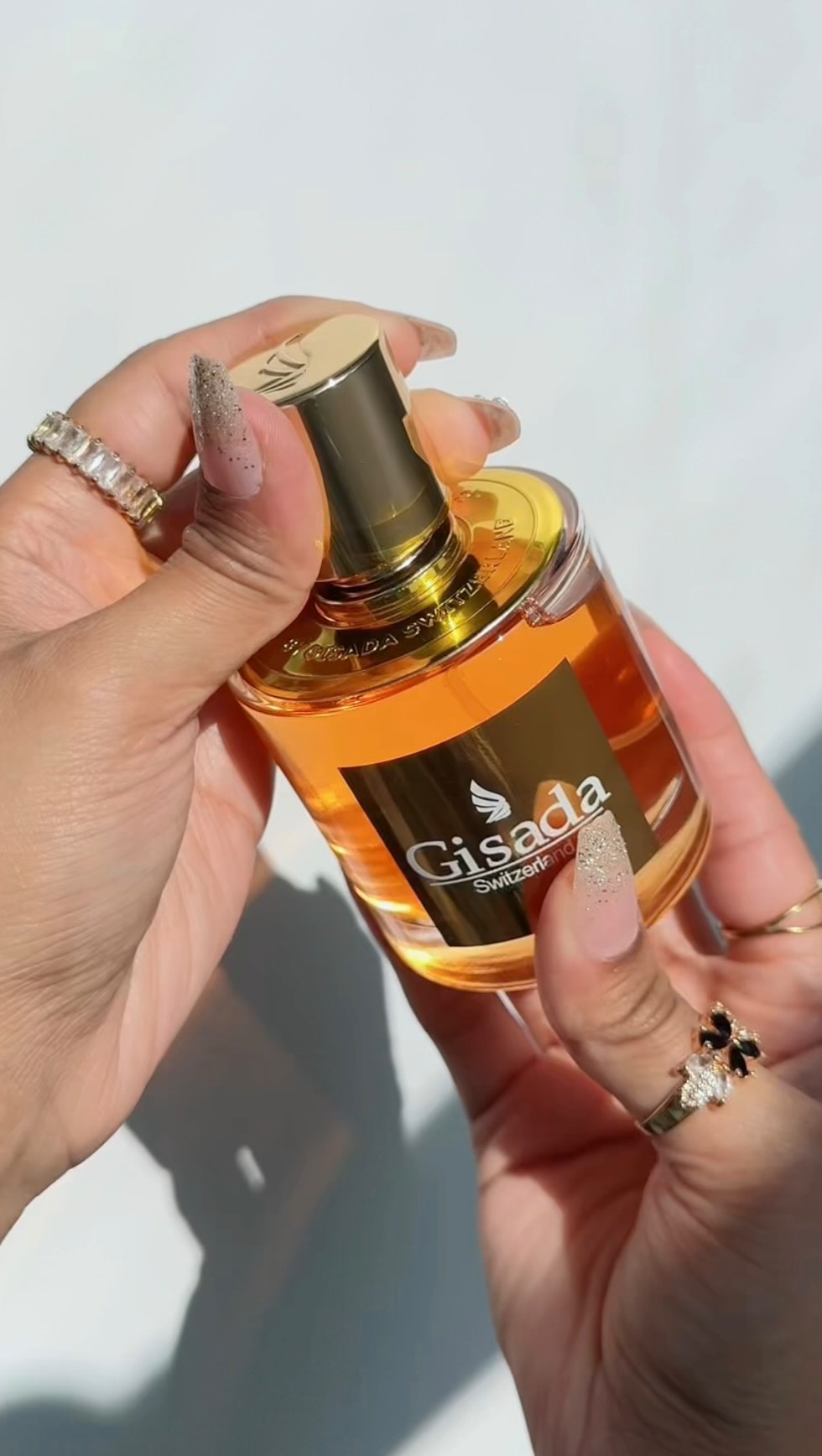 Instagram post by @makeupbynoor03 for Gisada. Caption reads: @gisadaofficial Ambassador Women Eau de Parfum....