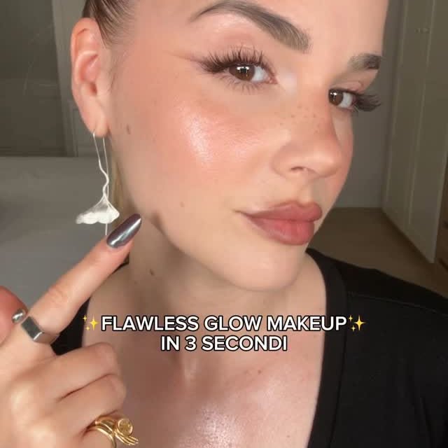 Instagram post by @nisi.fink for dalbaglobal. Caption reads: Flawless Glow Makeup in 3 secondi con il First....