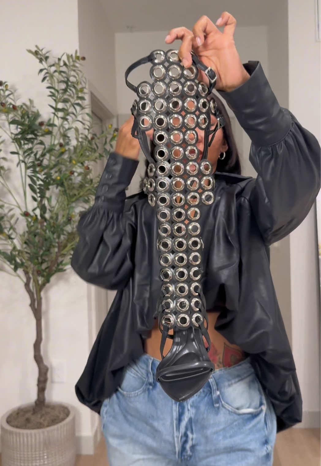 TikTok post by @neenthedream for ShopAKIRA. Caption reads: @AKIRA 🔥🔥🔥🔥 Just add  these boots to cart, ....